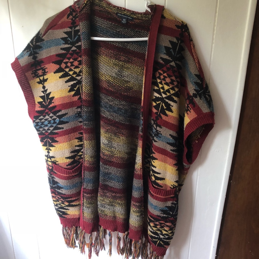 Hooded fringe poncho